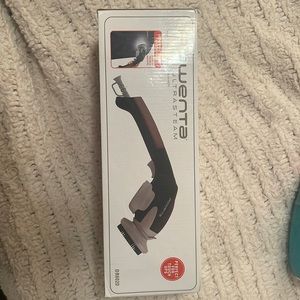 Rowenta Ultra Steam. Handheld fabric steamer. Includes accessories.New in Box